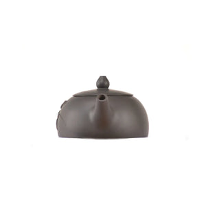 Handcrafted clay teapot No.17 featuring bamboo relief detailing and unglazed finish