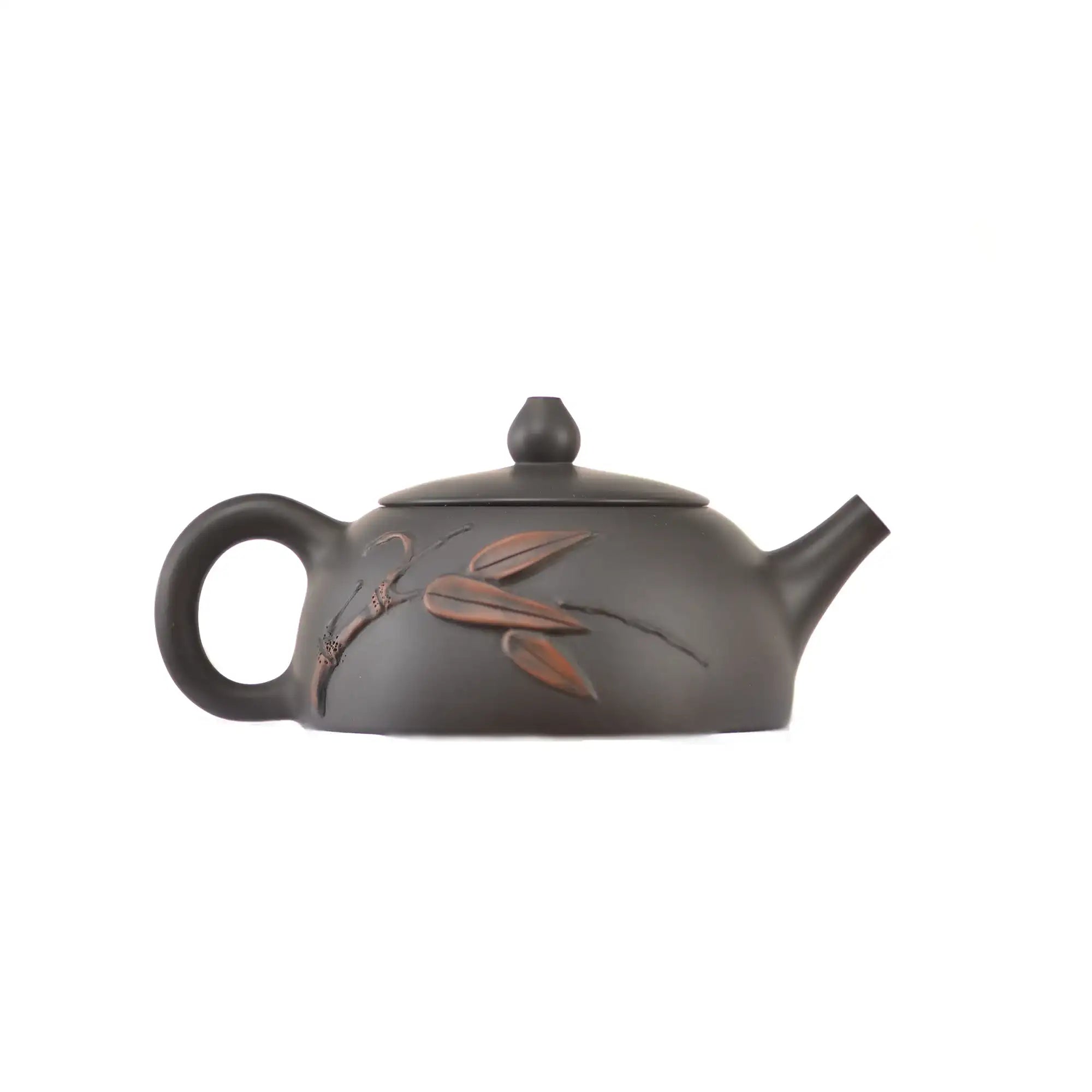 Side view of clay teapot No.17 showing raised bamboo relief design