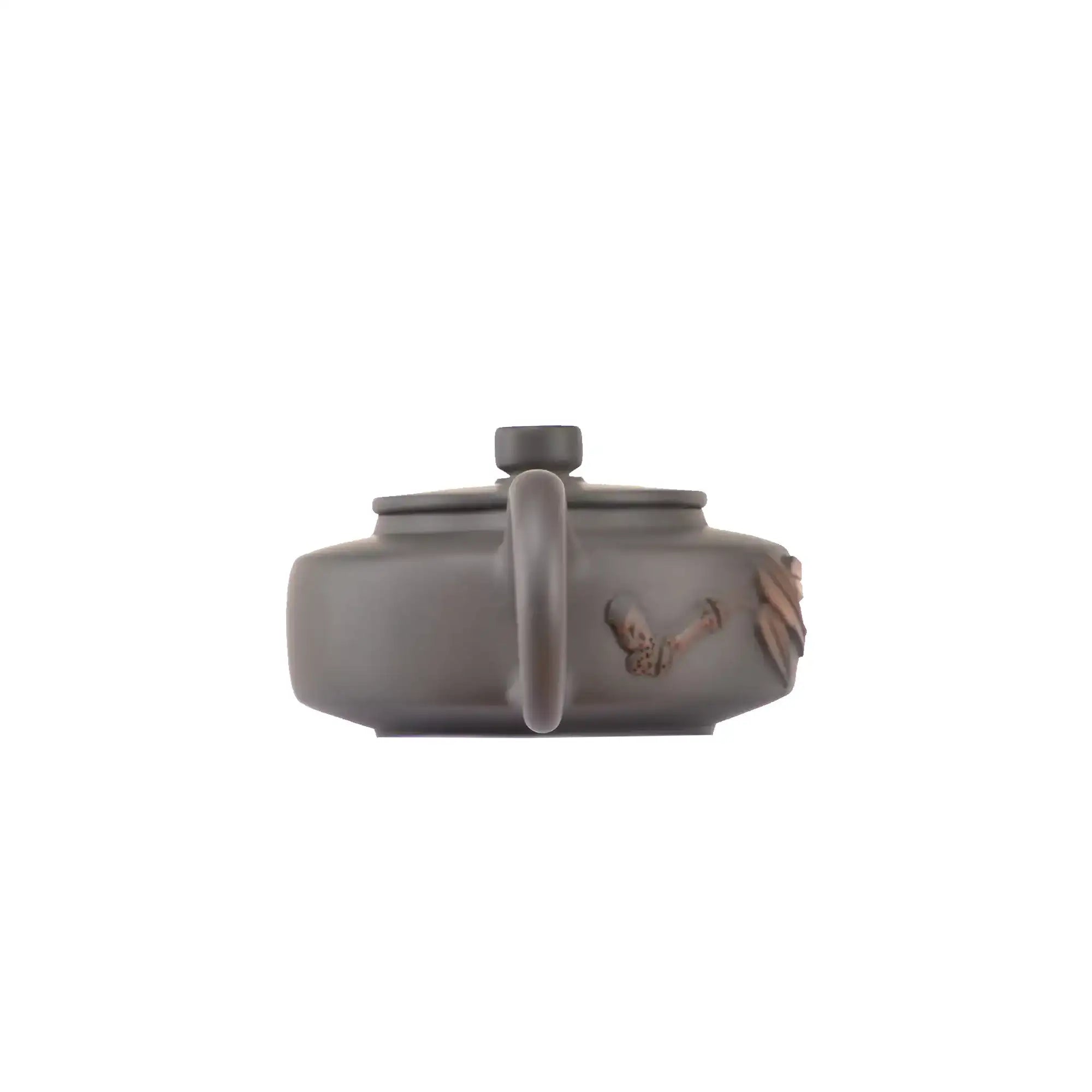 Back view of handcrafted clay teapot No.18 featuring bamboo relief texture