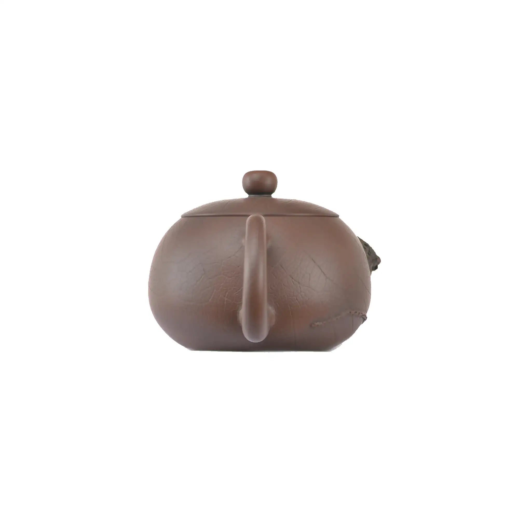 Back view of handcrafted clay teapot No.21 featuring Bodhi pattern and relief details