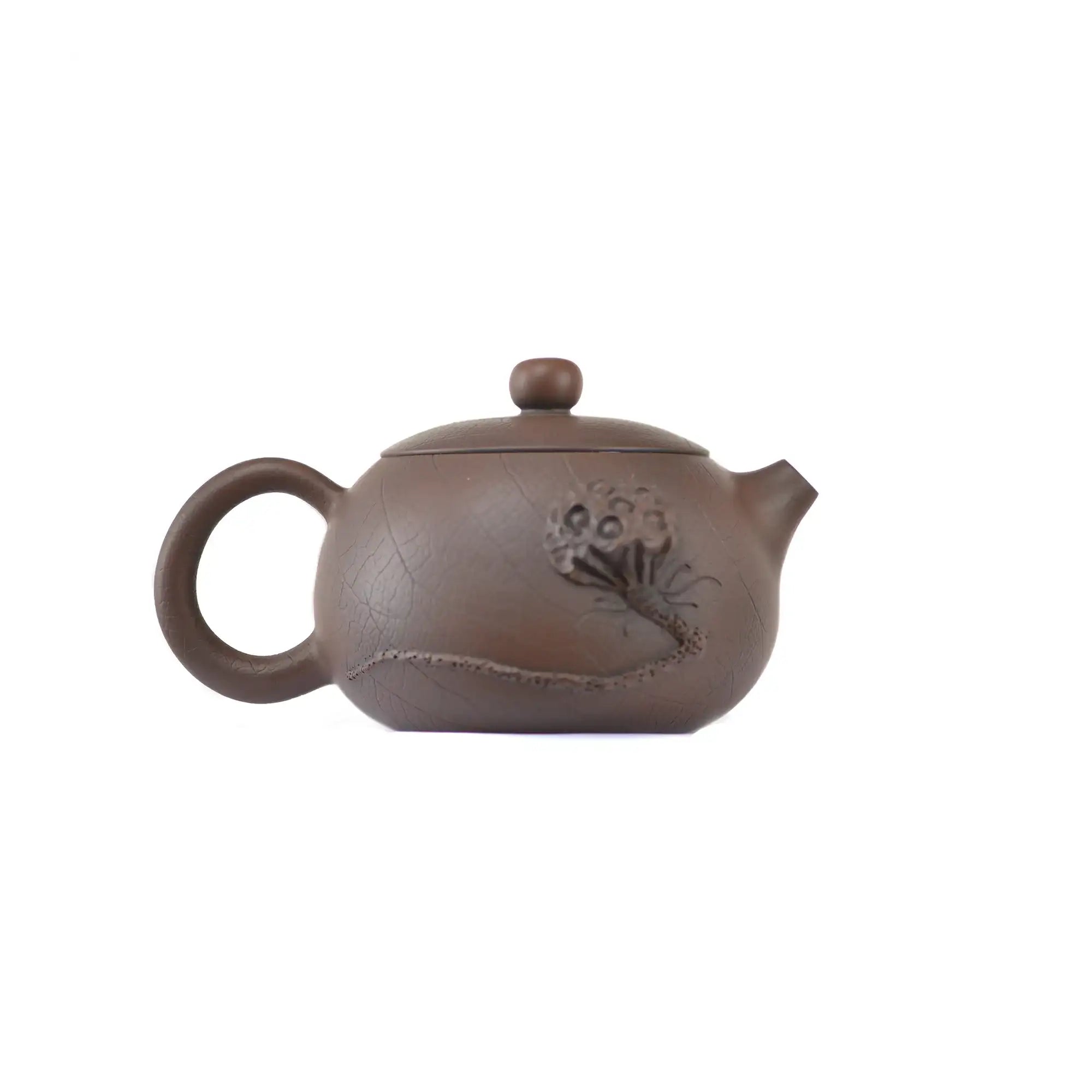 Side view of clay teapot No.21 showing Bodhi pattern texture and lotus pod relief design