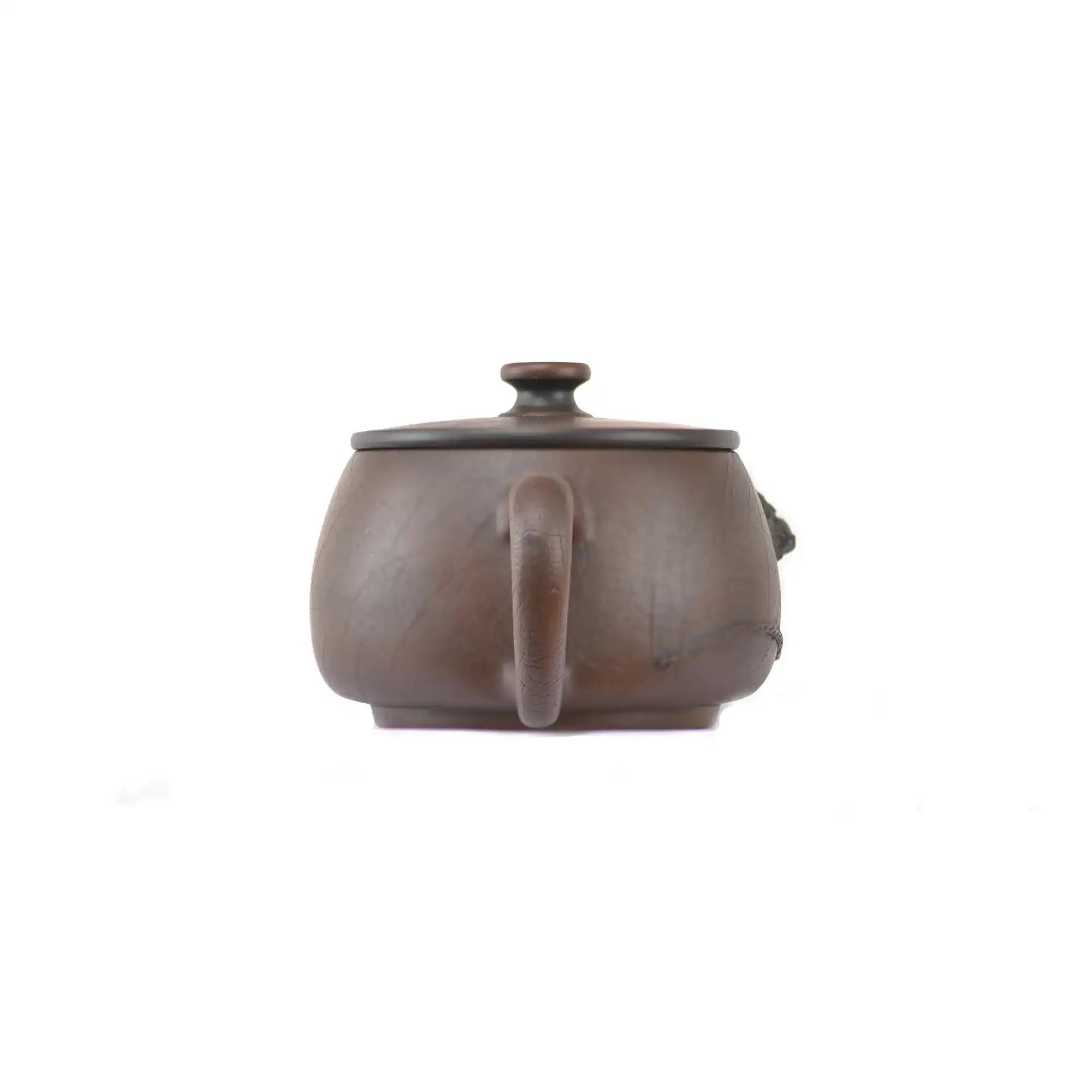 Back view of handcrafted clay teapot No.22 featuring Bodhi pattern and relief detail