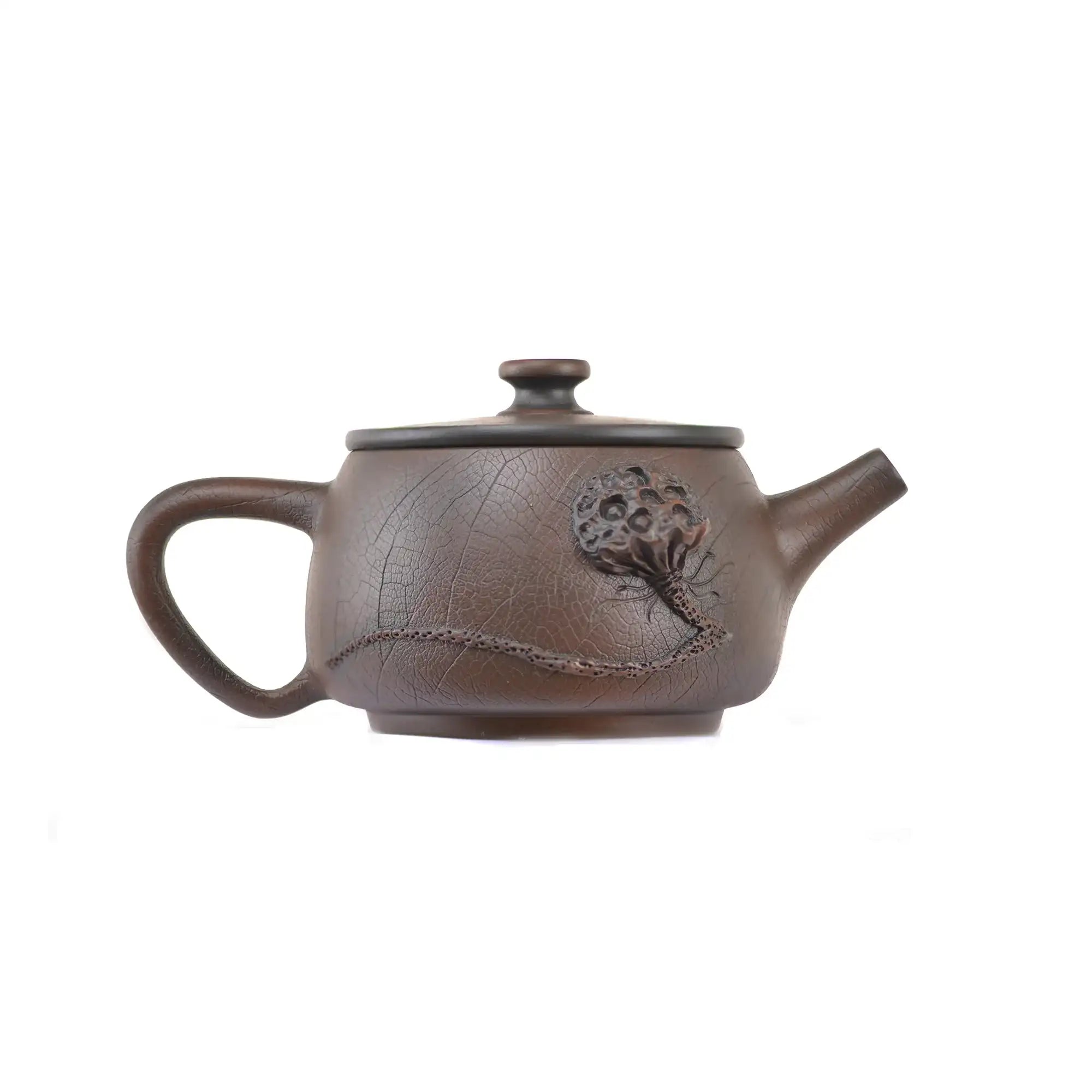 Side view of clay teapot No.22 showing Bodhi pattern texture and lotus pod relief design