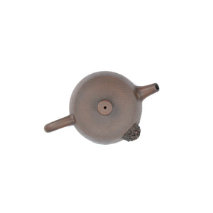 Top view of clay teapot No.22 highlighting lid shape and lotus pod relief detail