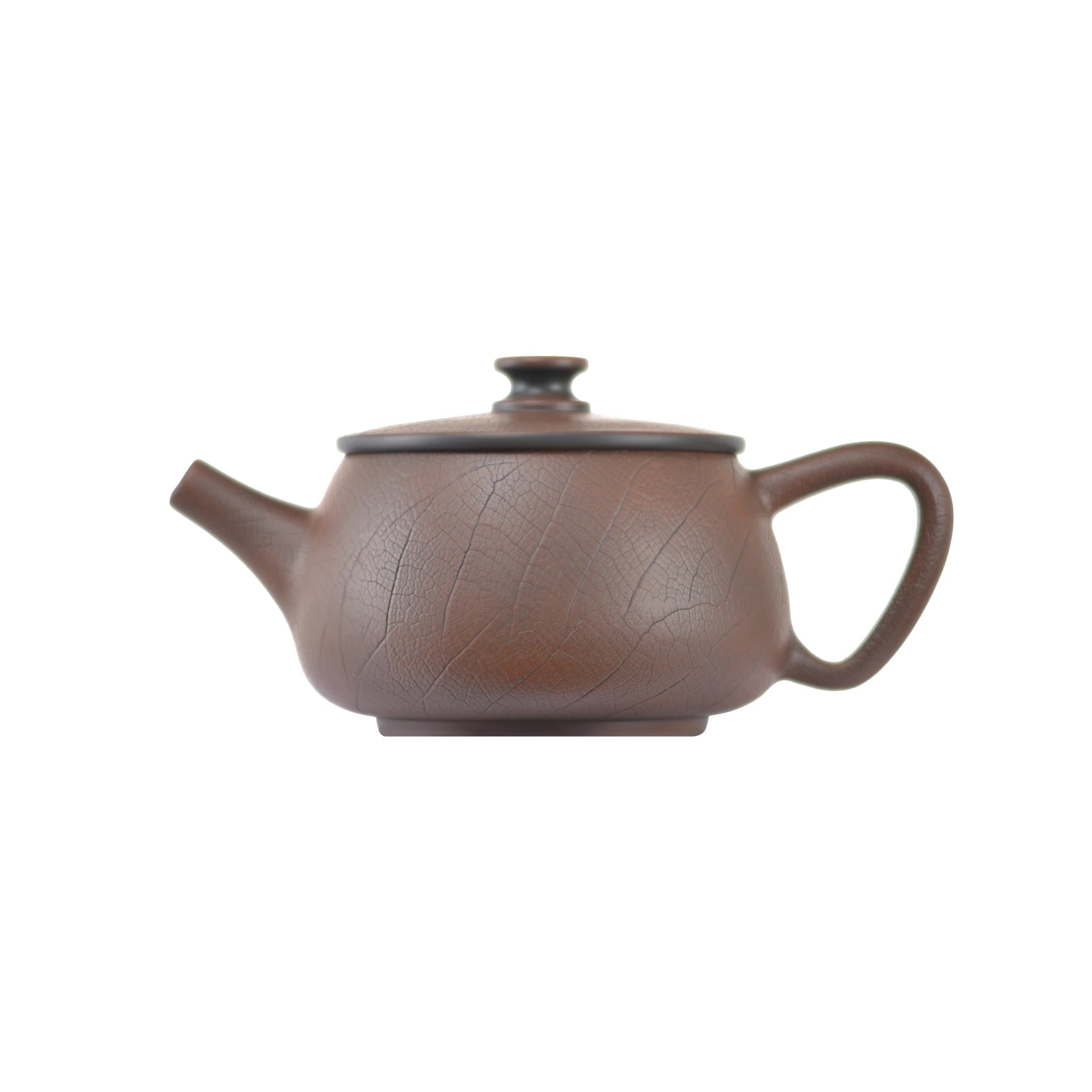 Side view of clay teapot No.10 with Bodhi pattern carving and traditional form