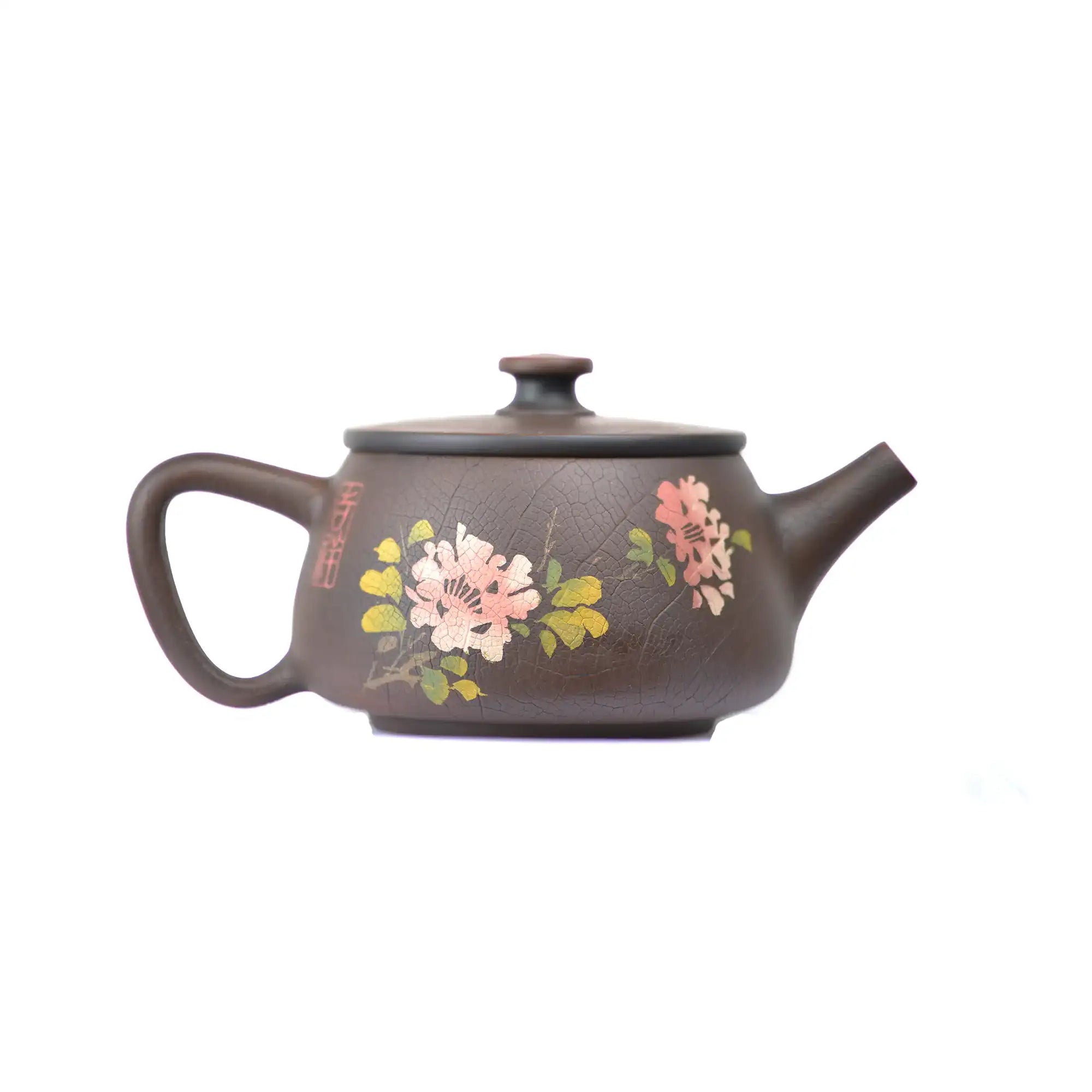 Side view of clay teapot No.28 showing Bodhi pattern texture and yin-carved peony motif