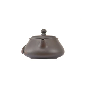 Handcrafted clay teapot No.15 featuring coin relief detailing and unglazed finish