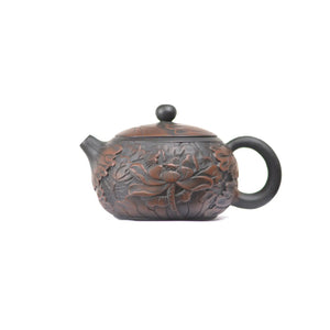 Side view of clay teapot No.30 showing detailed full lotus carving decoration