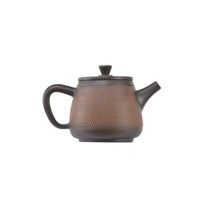 Alternate side view of clay teapot No.12 with textured jumping knife pattern