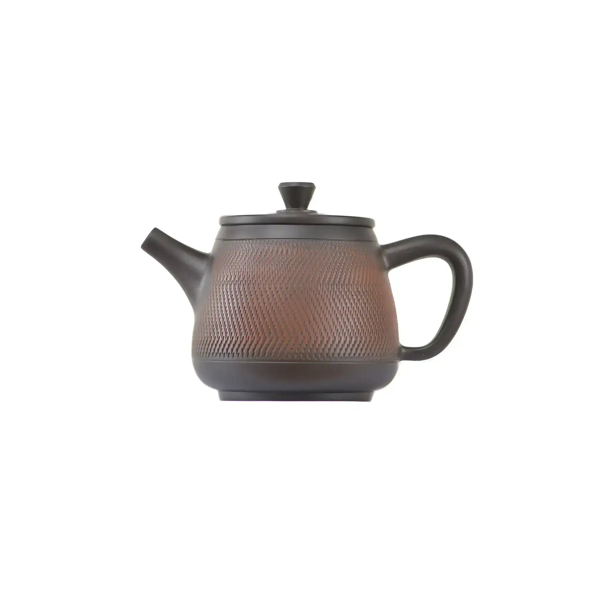 Side view of clay teapot No.12 showing handcrafted jumping knife texture