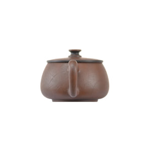 Back view of handcrafted clay teapot No.10 with clean plain surface