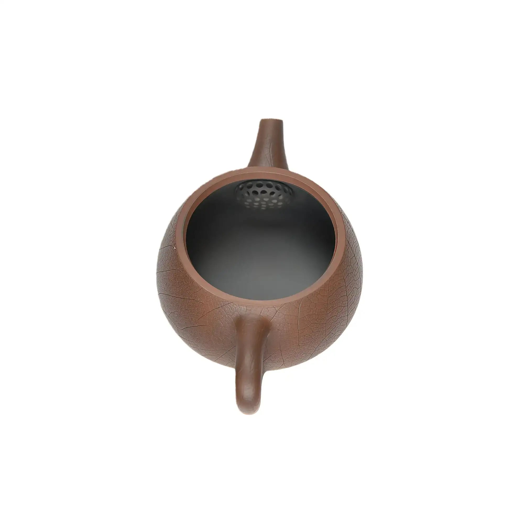 Open view of clay teapot No.10 showing natural clay interior and pouring structure