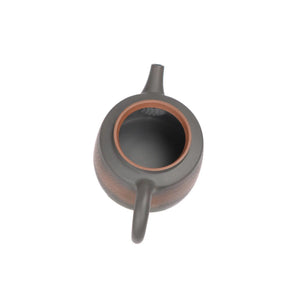 Open view of clay teapot No.11 showing natural clay interior and pouring structure