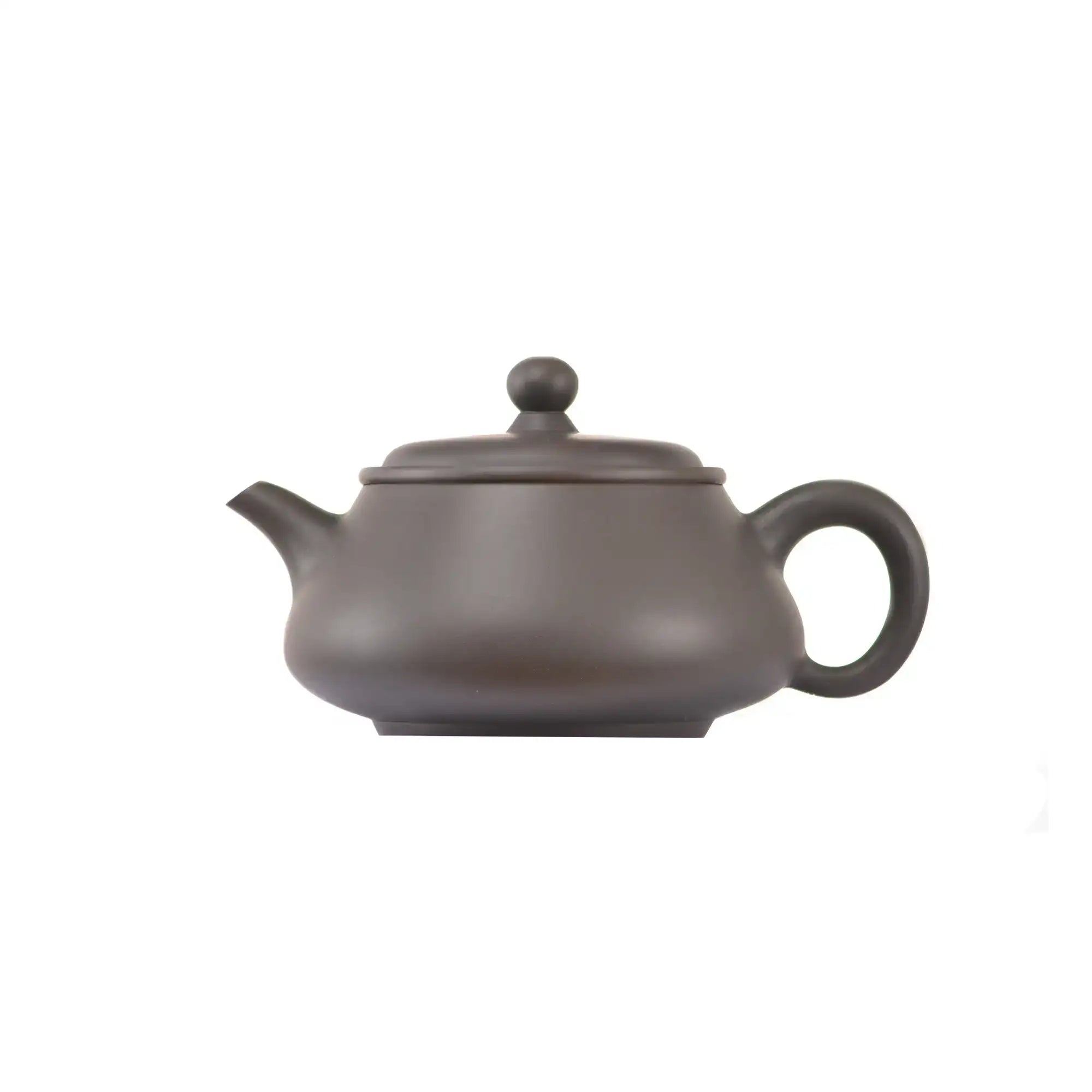 Side view of clay teapot No.15 with smooth uncarved surface and traditional form