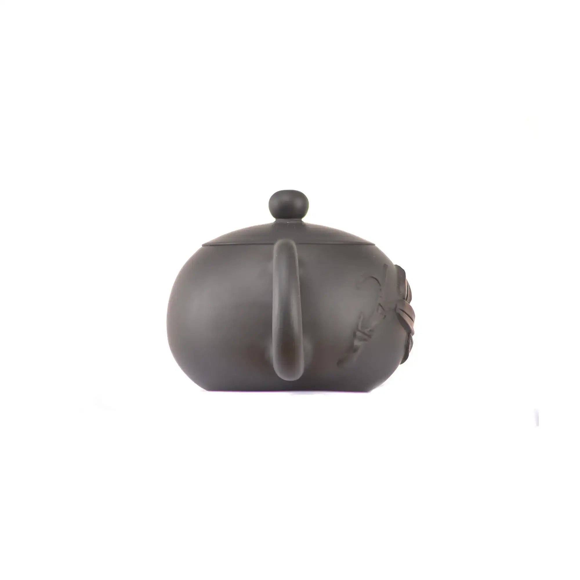 Back view of handcrafted clay teapot No.16 with smooth plain surface