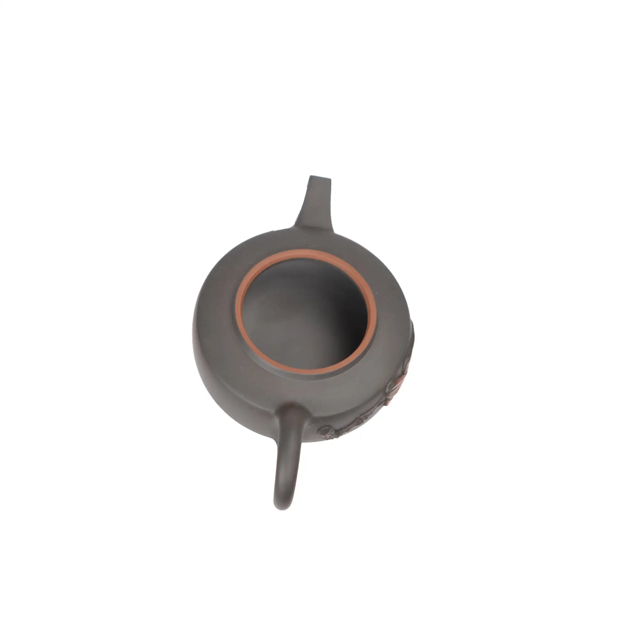 Open view of clay teapot No.18 showing natural clay interior and pouring structure