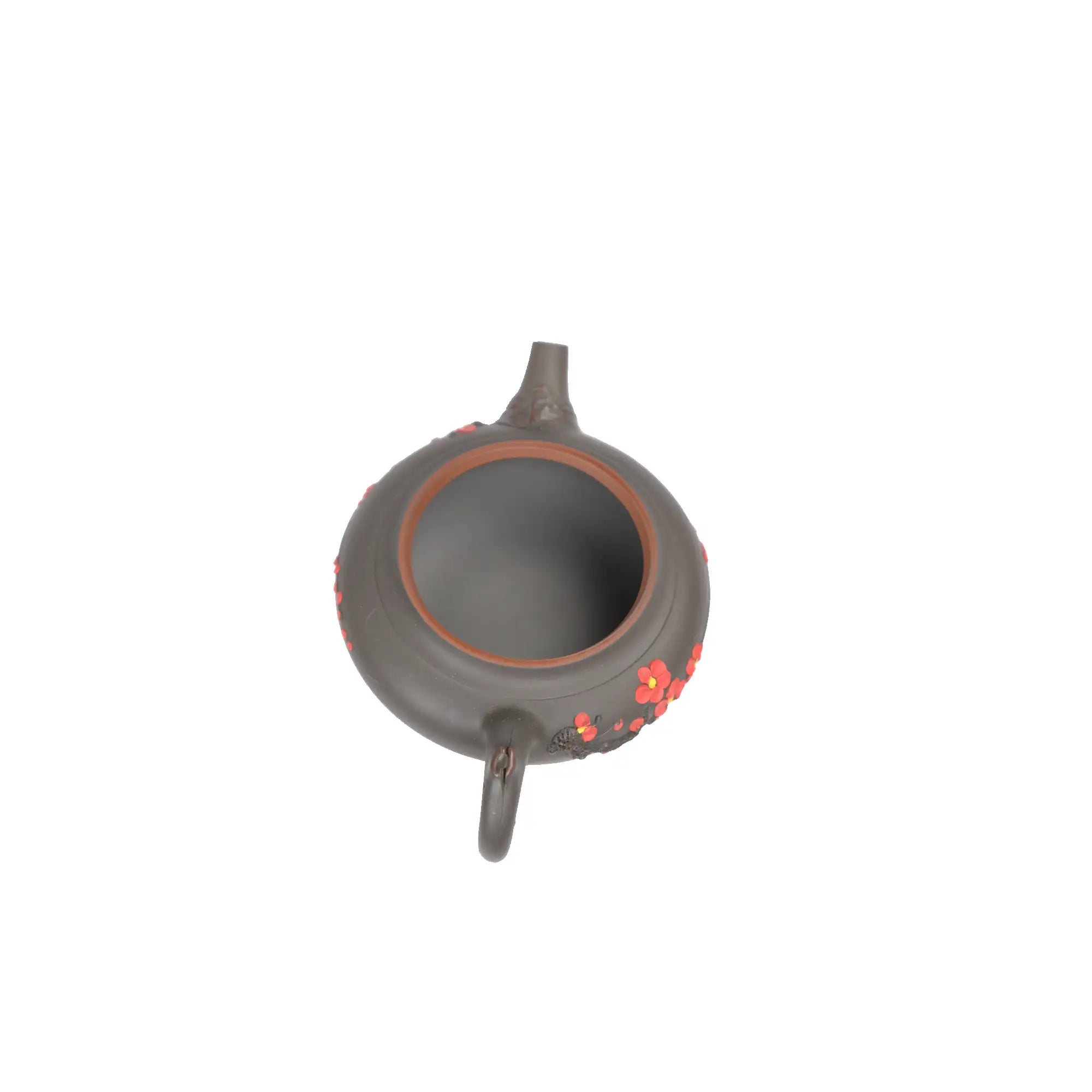 Open view of clay teapot No.19 showing natural clay interior and pouring structure