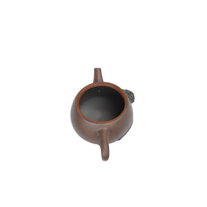 Open view of clay teapot No.22 showing natural clay interior and pouring structure