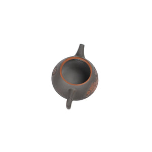 Open view of clay teapot No.23 showing natural clay interior and pouring structure
