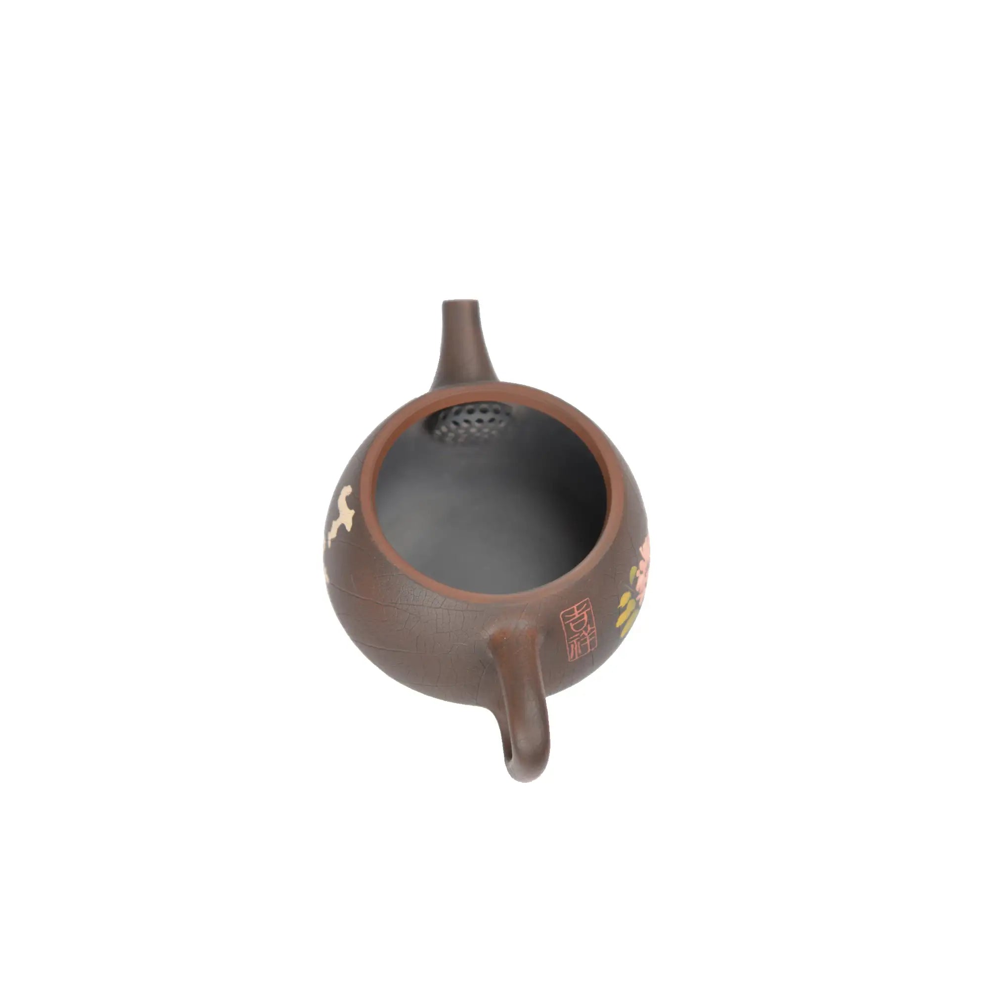 Open view of clay teapot No.28 showing natural clay interior and pouring structure