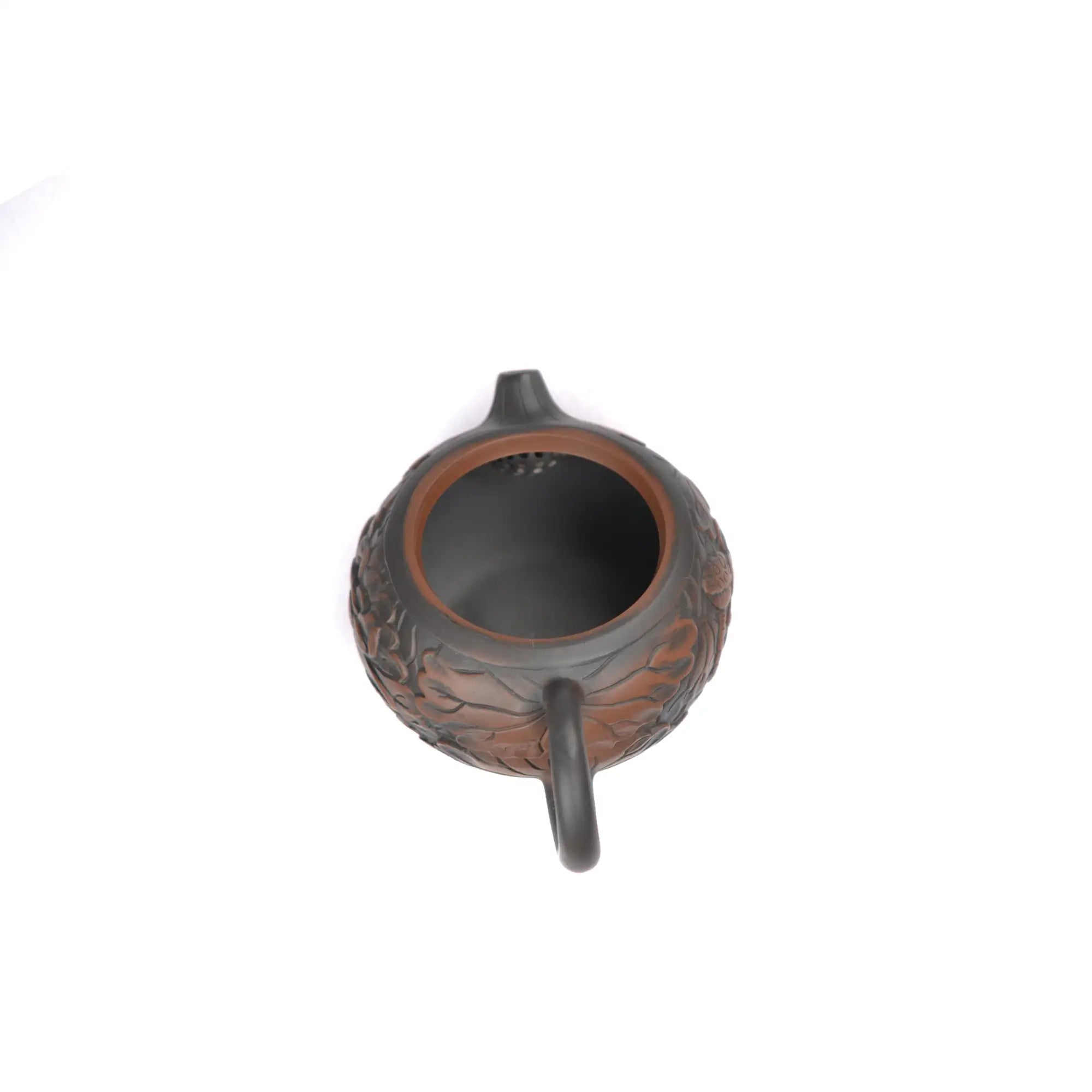Open view of clay teapot No.30 showing natural clay interior and pouring structure