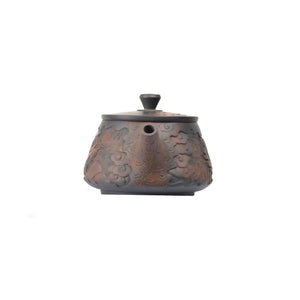 Front view of PorSva No.34 Shipiao fully carved phoenix clay teapot