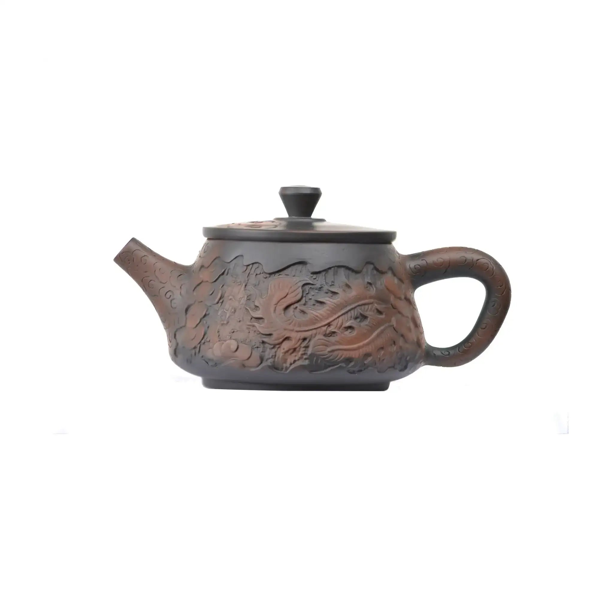 Left side view of PorSva No.34 Shipiao phoenix clay teapot highlighting detailed hand-carved feather texture