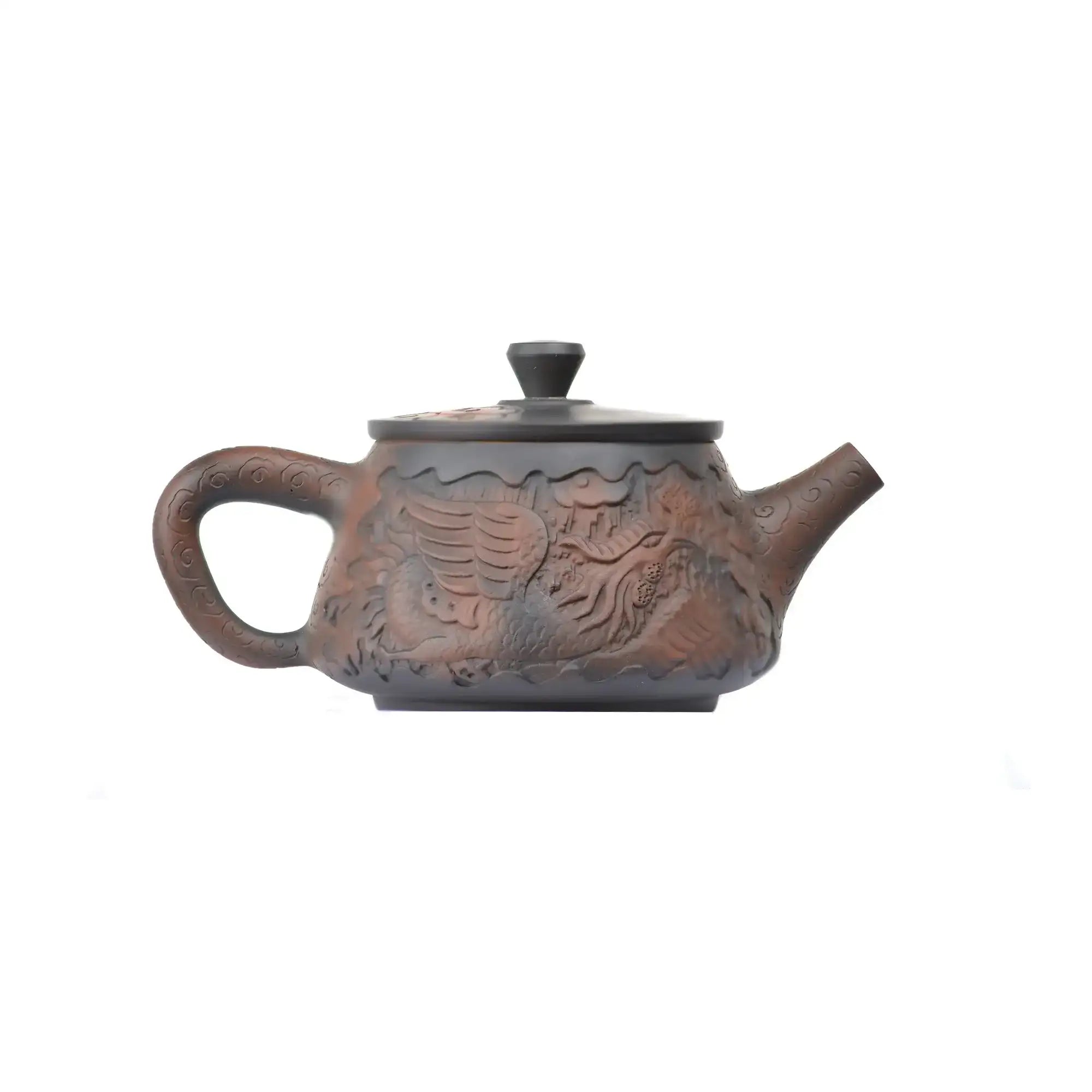Right side view of PorSva No.34 Shipiao fully carved phoenix clay teapot showing continuous relief carving