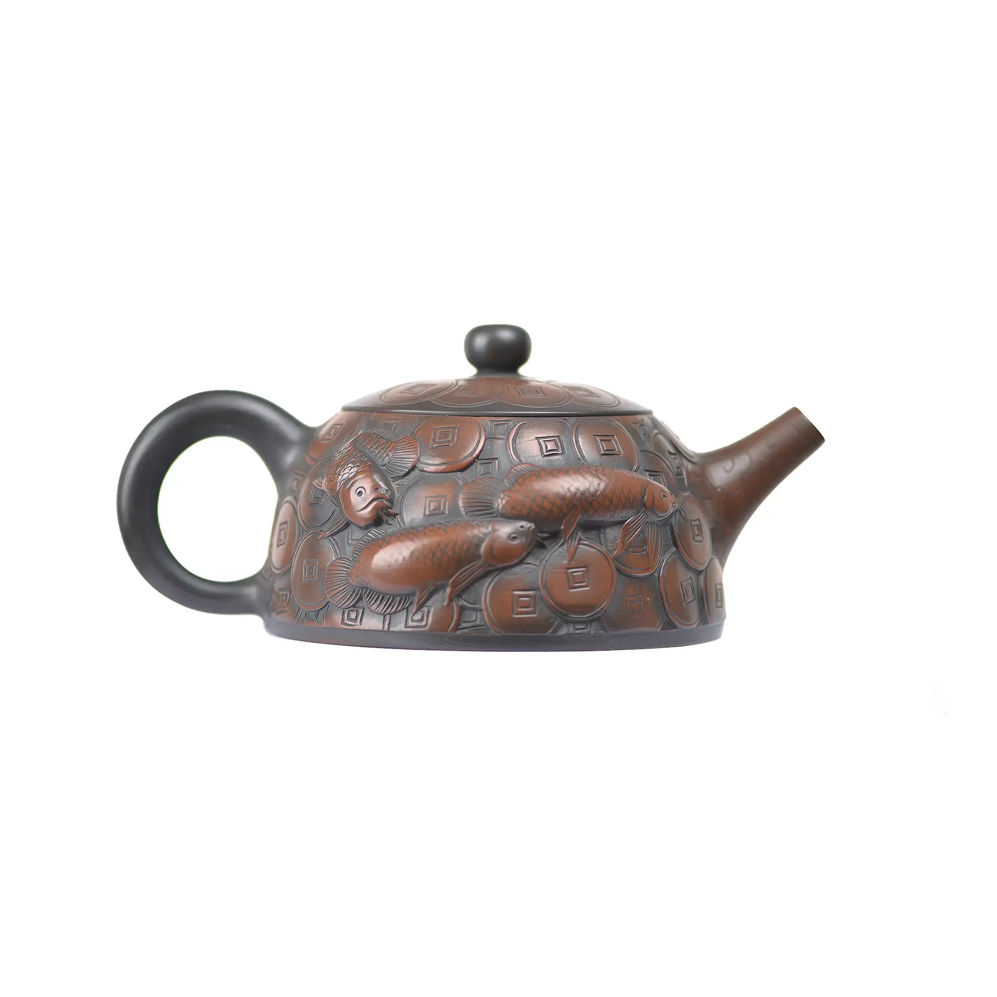 Right side view of PorSva No.35 clay teapot showing continuous relief design
