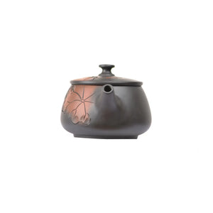 Front view of PorSva No.39 Hanwa lotus line-carved clay teapot