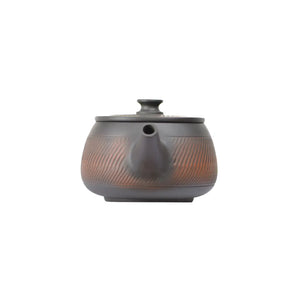 Front view of PorSva No.40 Hanwa chattering-knife texture clay teapot