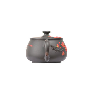Back view of PorSva No.43 Hanwa plum blossom clay teapot showing natural clay texture