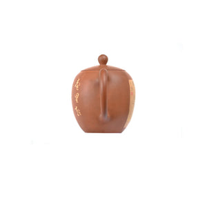 Back view of PorSva No.49 red clay teapot highlighting natural clay texture
