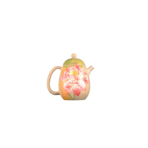 Right side view of PorSva No.58 clay teapot showing detailed lotus carving with white clay inlay