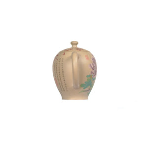 Back view of PorSva No.59 clay teapot highlighting natural clay surface
