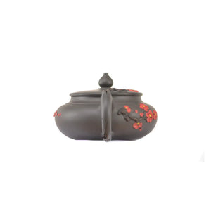 Back view of handcrafted clay teapot No.19 featuring plum root-art texture