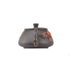 Back view of handcrafted clay teapot No.20 featuring plum root-art texture