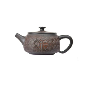 Left side view of PorSva No.37 Hanwa clay teapot featuring engraved Chinese Fu character symbolizing good fortune