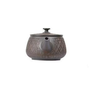 Front view of PorSva No.38 Hanwa pattern clay teapot, machine-carved design style 3