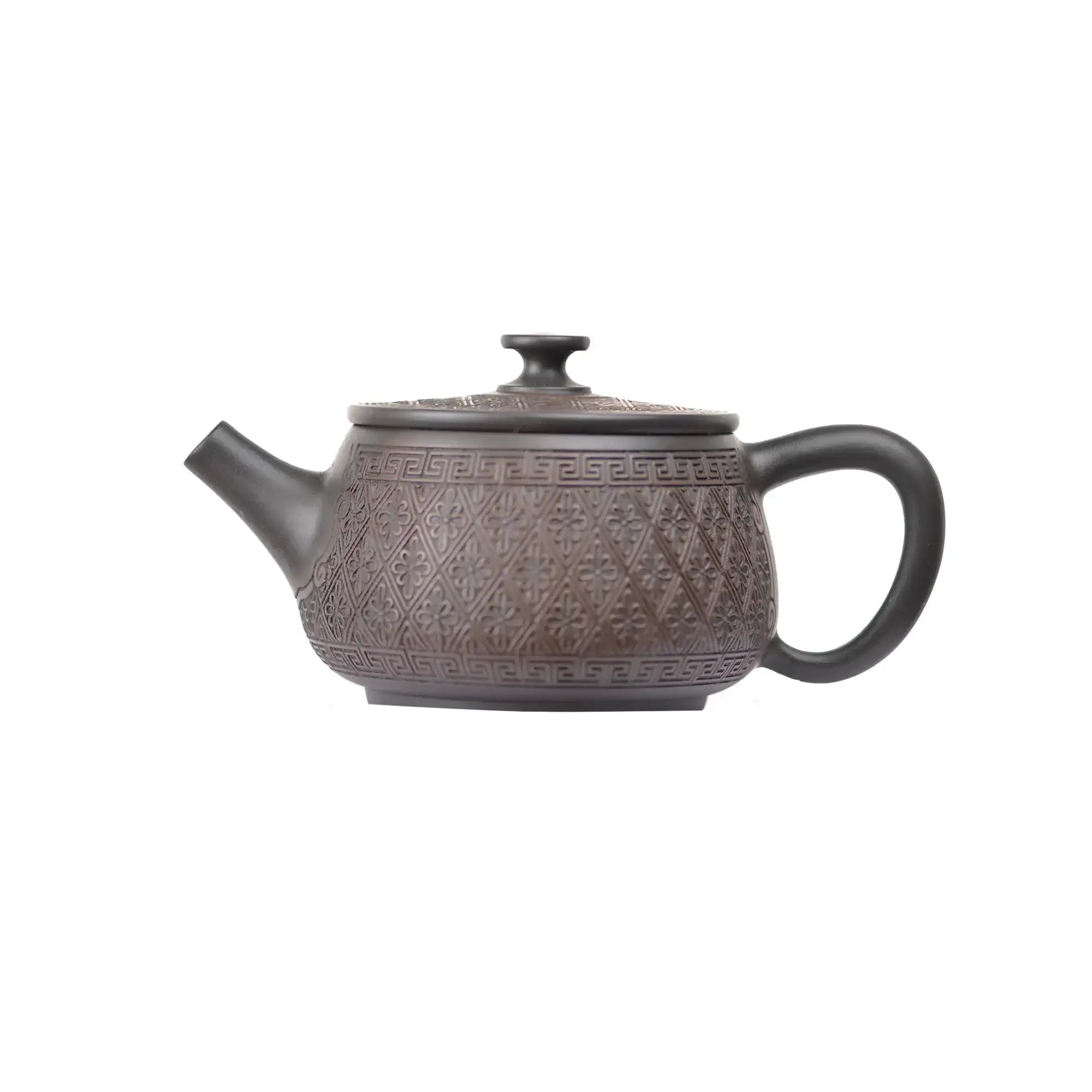Left side view of PorSva No.38 Hanwa clay teapot featuring engraved decorative pattern style 3