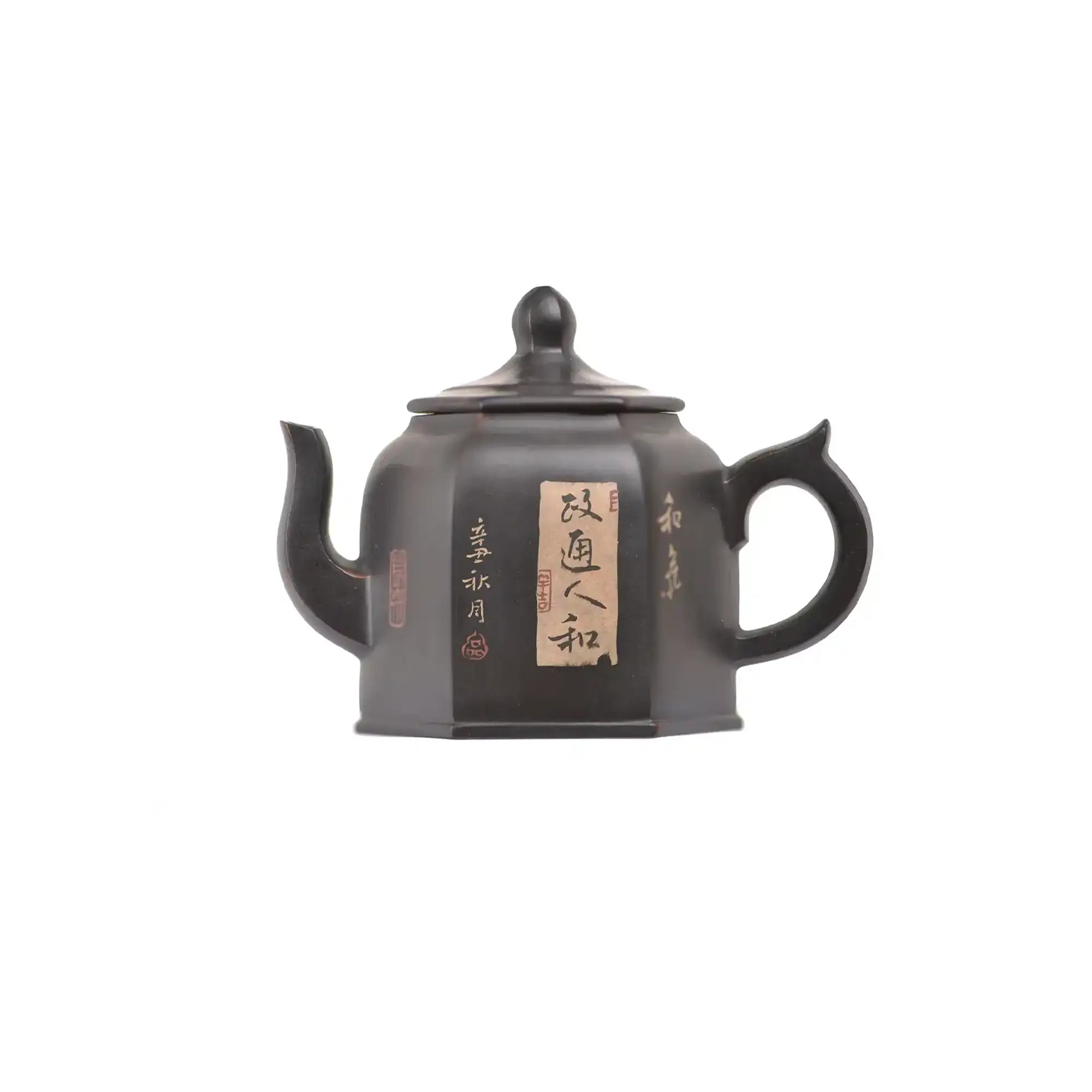 Left side view of PorSva No.57 hexagonal clay teapot featuring carved Chinese calligraphy with clay inlay