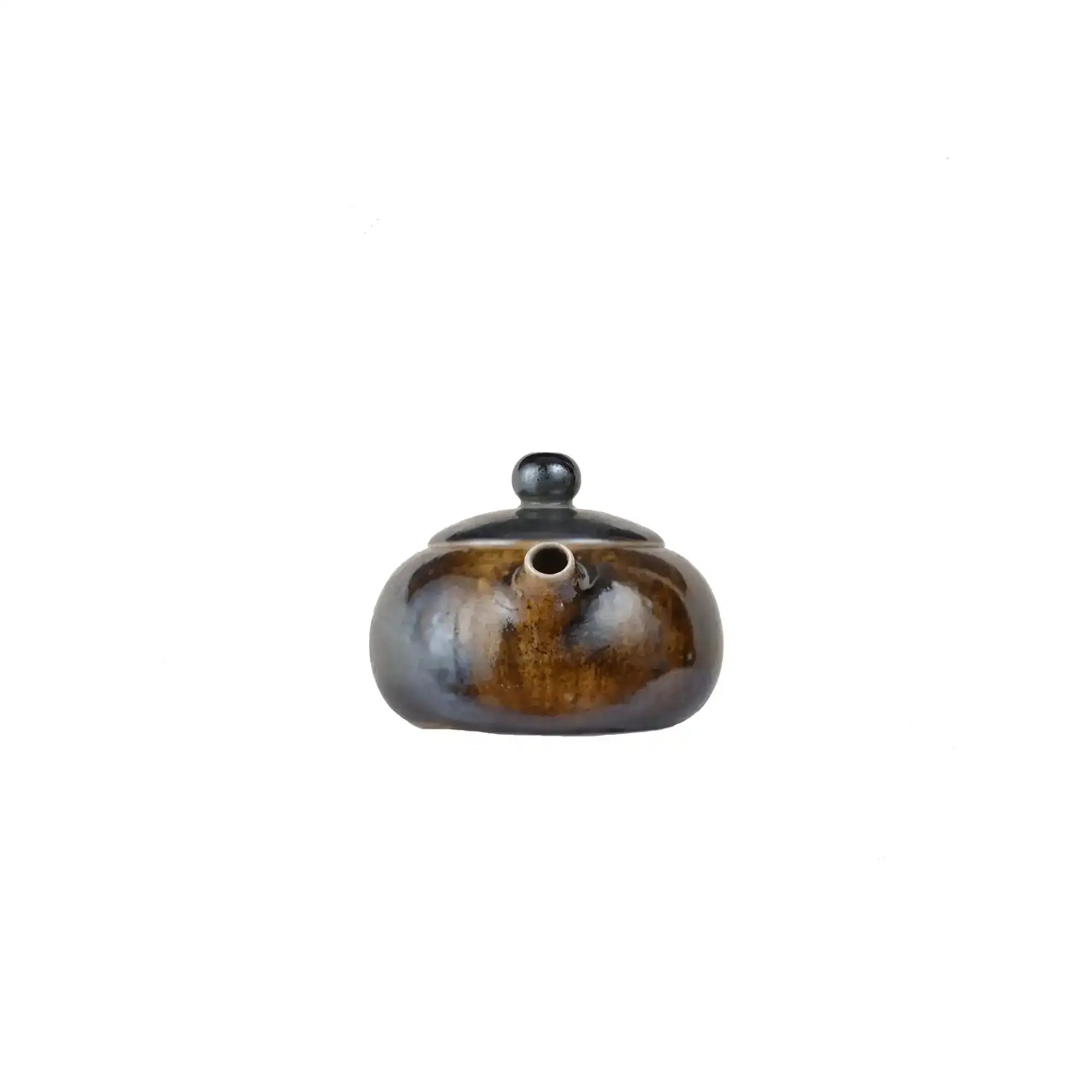 Front view of PorSva No.60 wood-fired clay teapot showing natural kiln firing marks