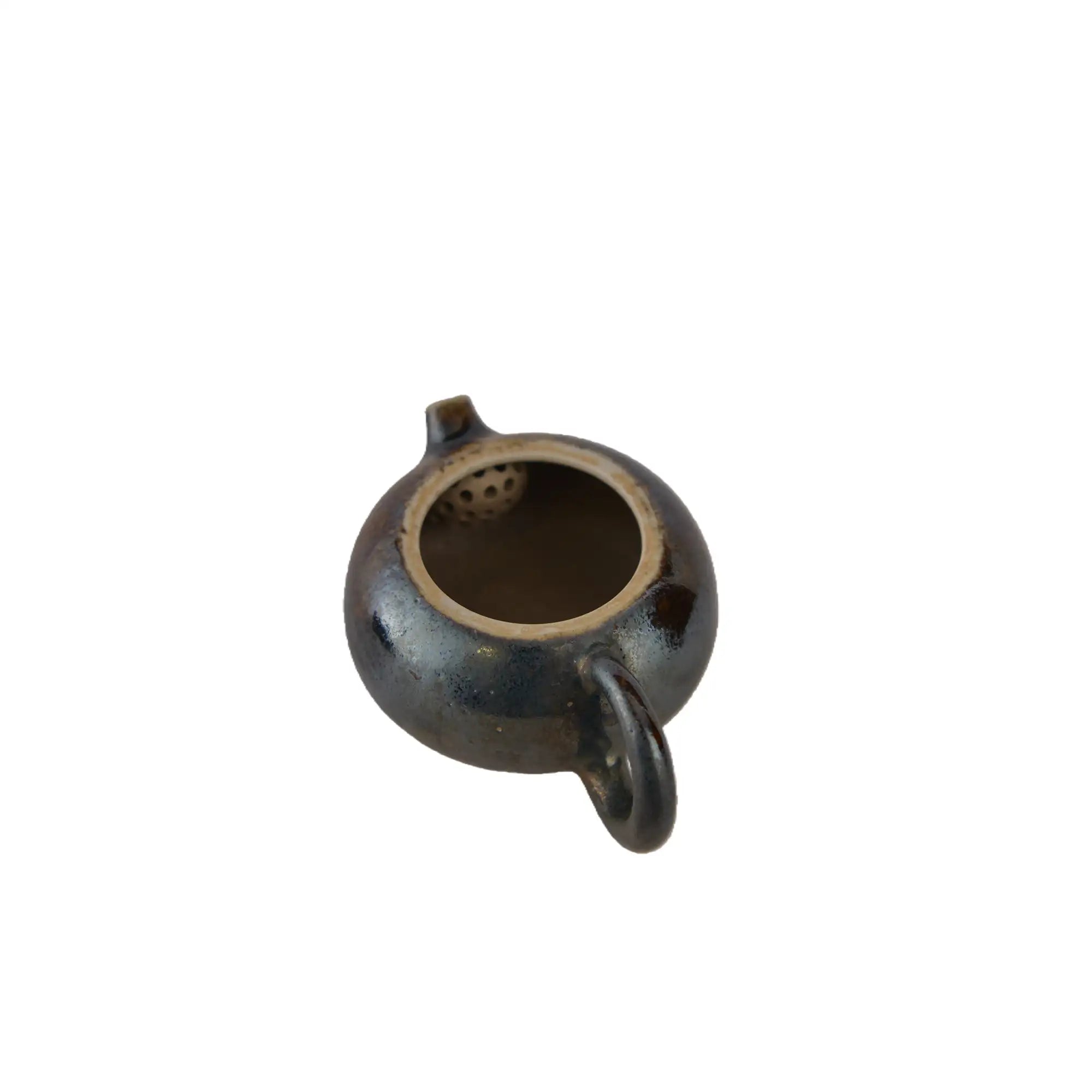 Interior view of PorSva No.60 wood-fired clay teapot showing natural unglazed interior