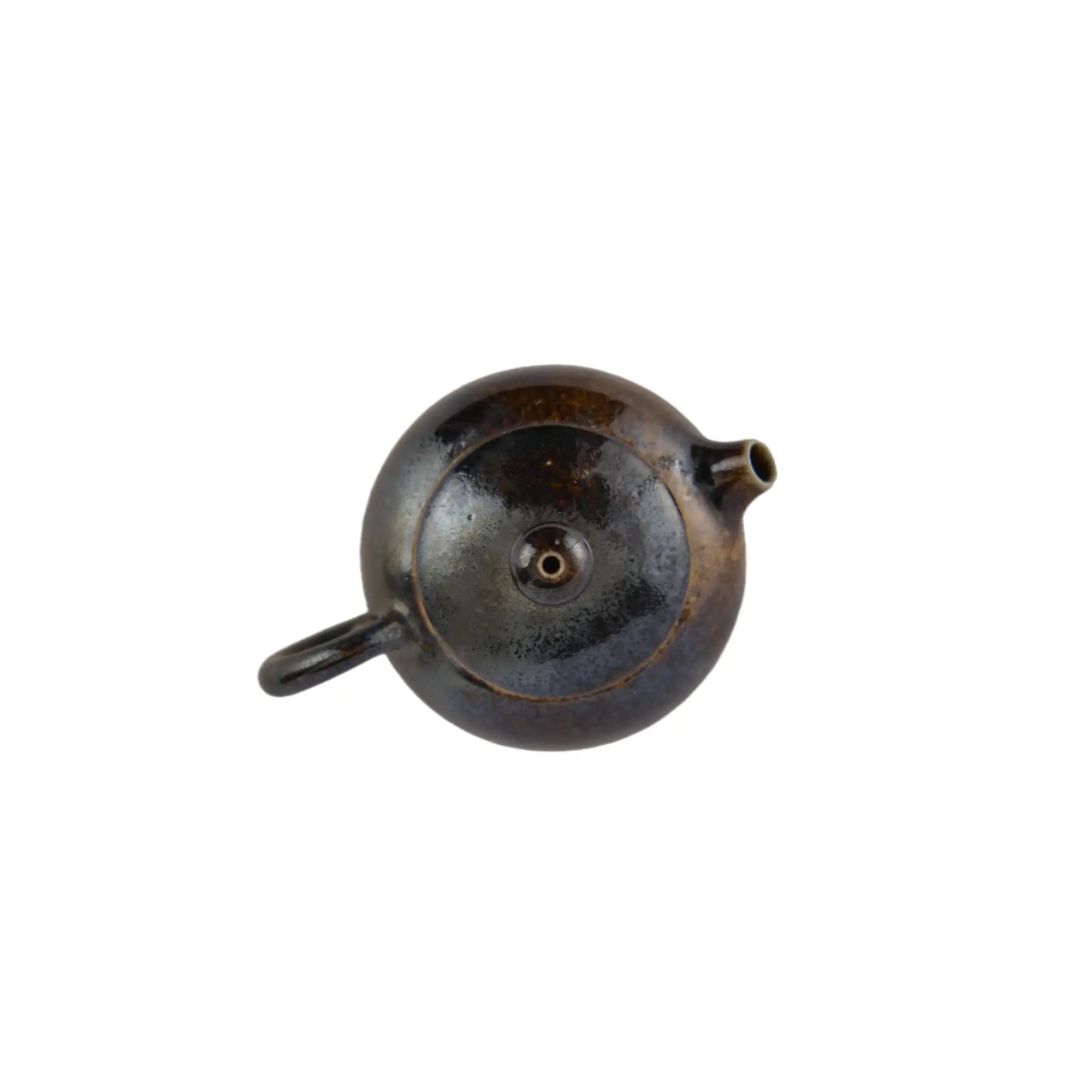 Top view of PorSva No.60 wood-fired clay teapot showing lid structure and firing texture