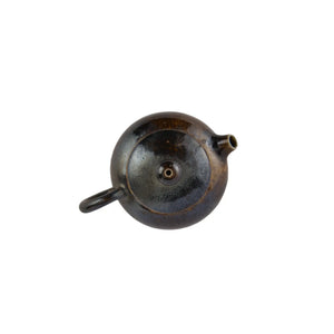 Top view of PorSva No.60 wood-fired clay teapot showing lid structure and firing texture