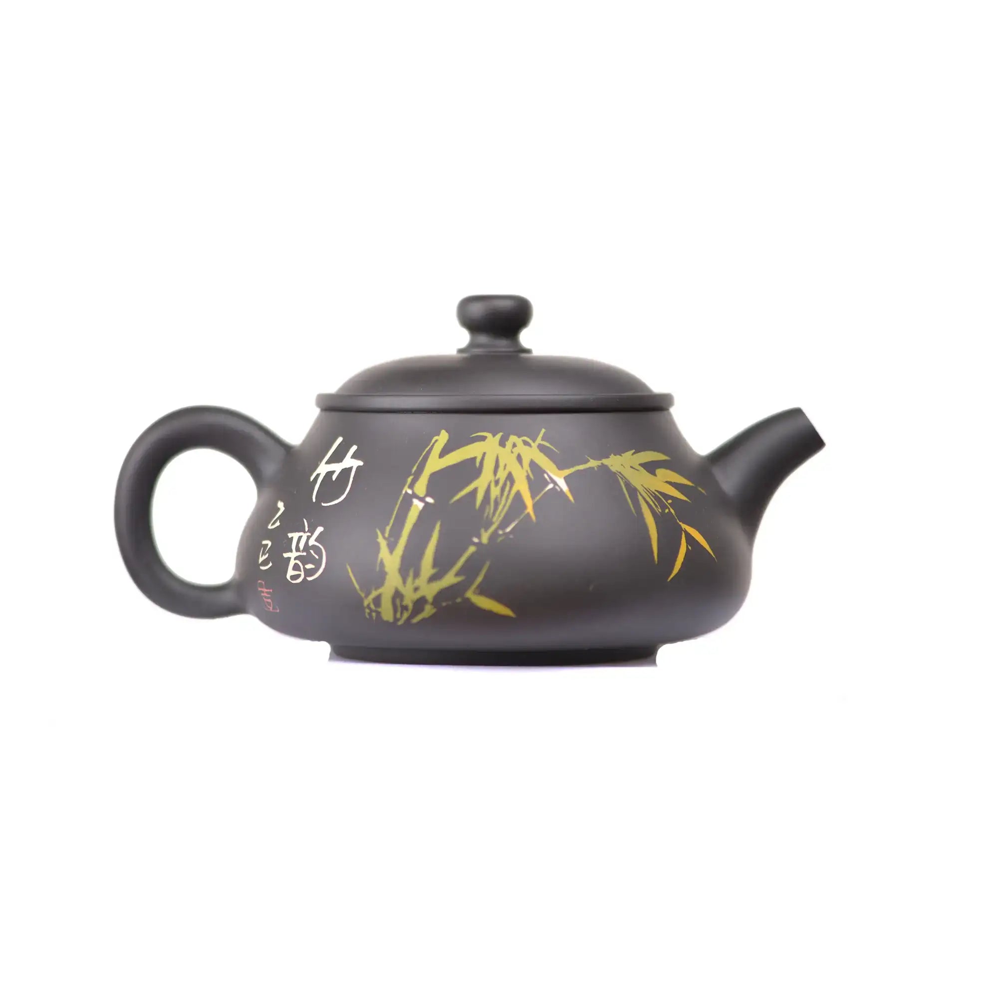 Side view of clay teapot No.26 showing yin-carved and yang-inlaid bamboo design