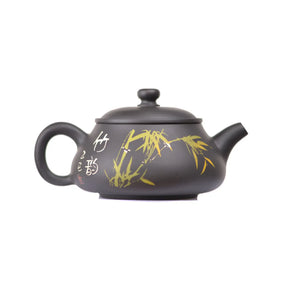 Side view of clay teapot No.26 showing yin-carved and yang-inlaid bamboo design