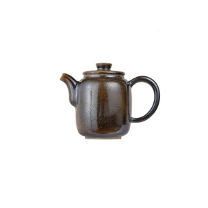 Left side view of PorSva No.66 wood-fired clay teapot with natural ash firing effects