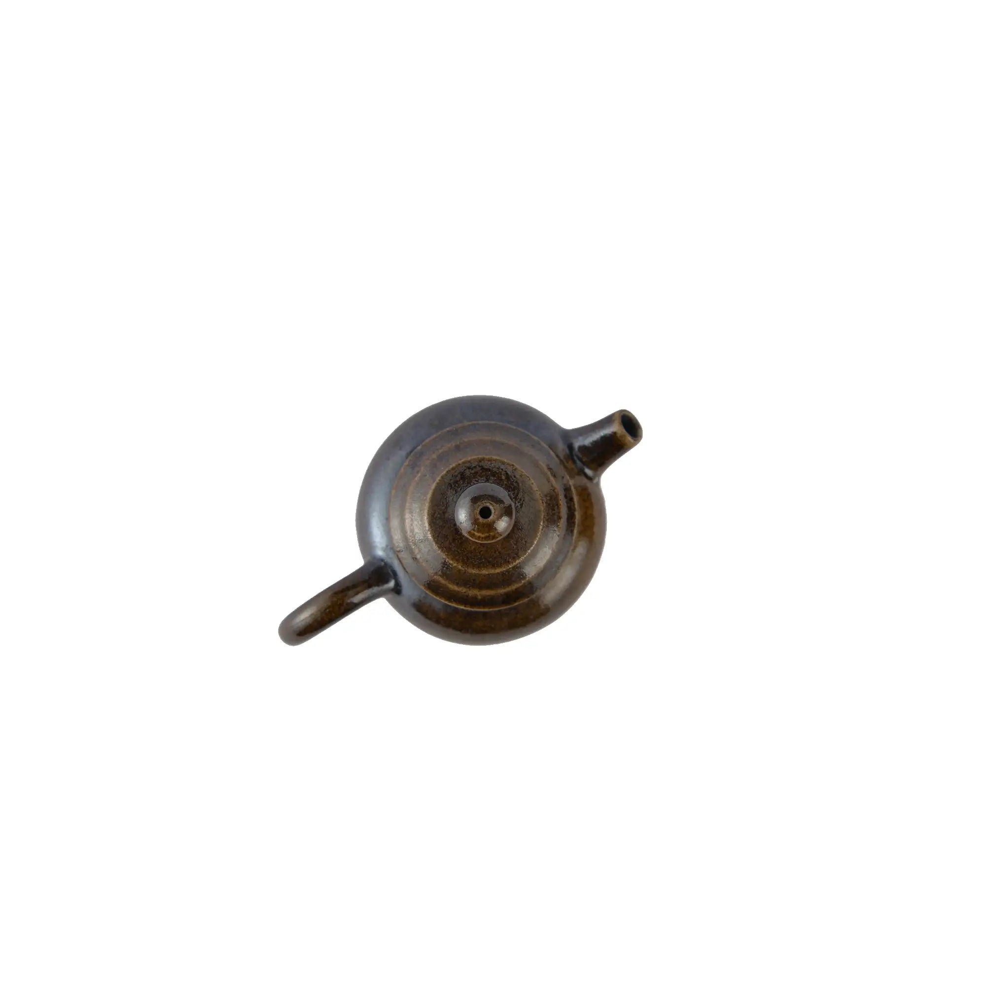 Top view of PorSva No.66 wood-fired clay teapot showing lid structure and firing texture