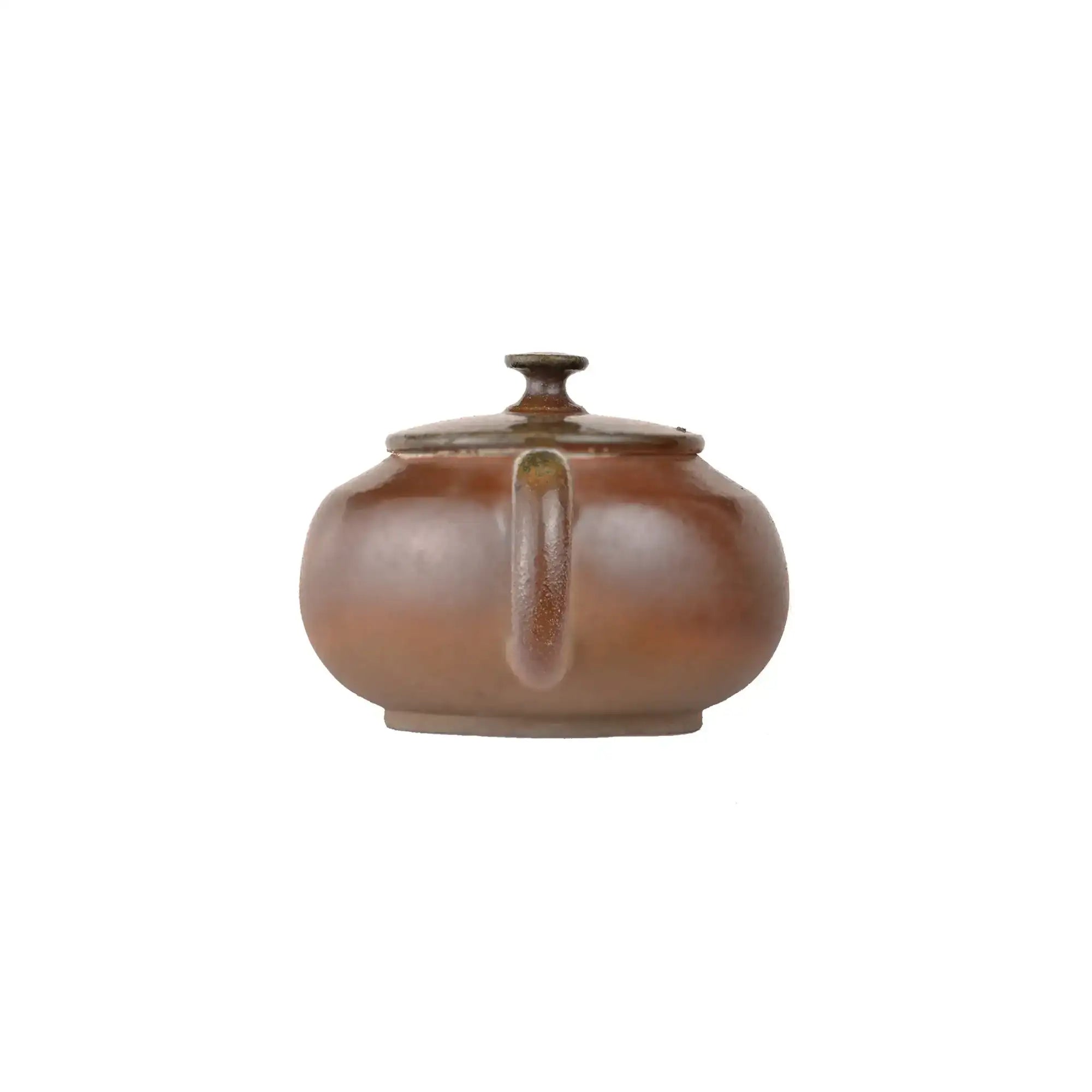 Back view of PorSva No.45 wood-fired Jianshui clay teapot displaying natural kiln transformation